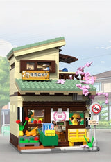 CADA Japoniškos parduotuvės "Kitty" LED šviesa statybiniai blokeliai 921 elementas