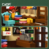 CADA Japoniškos parduotuvės "Kitty" LED šviesa statybiniai blokeliai 921 elementas