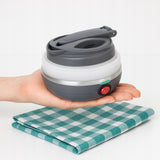 Sulankstomas silikoninis turistinis arbatinukas, pilkas, 0,6L