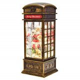 Kalėdinė dekoracija - telefono būdelė su Kalėdų seneliu, dovanomis ir krentančiu sniegu