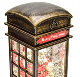 Kalėdinė dekoracija - telefono būdelė su Kalėdų seneliu, dovanomis ir krentančiu sniegu