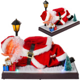 Raudona animuota Kalėdų Senelio figūrėlė su garsu ir apšvietimu