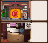 Statybinės kaladėlės CADA Pastatas SENTO Japonų pirtis LED šviesos 1249 elementai Rinkinys