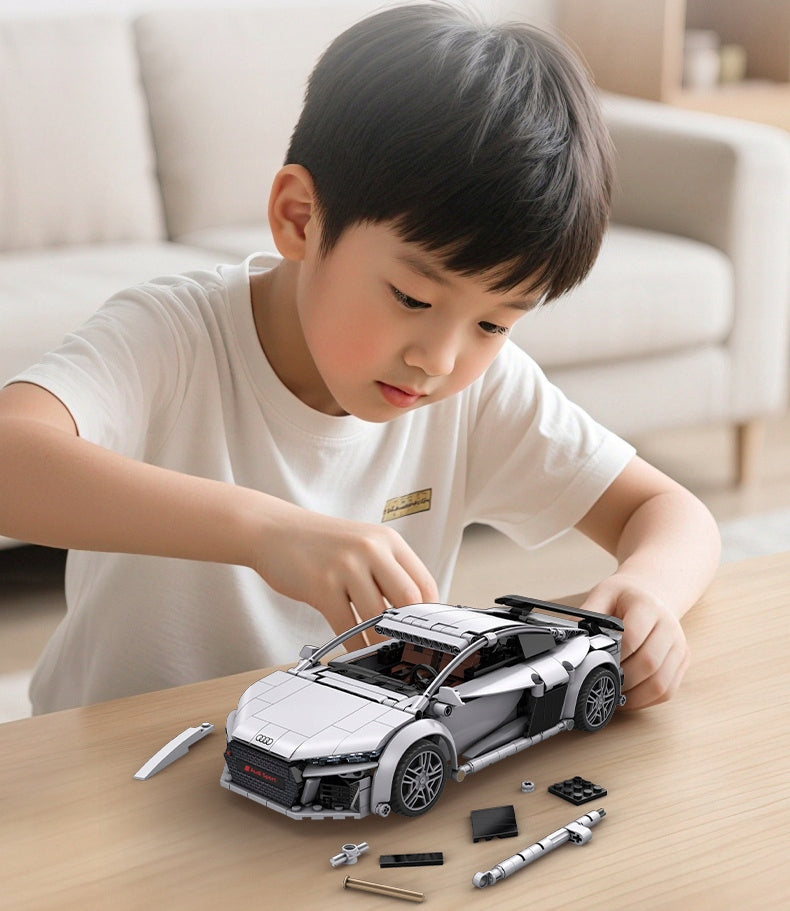 CADA Statybiniai blokeliai, RC lenktyninis automobilis AUDI R8 COUPE 1:14, nuotoliniu būdu valdomas, 536 elementai.