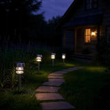 Rinkinys 4 saulės šviestuvų su sutemų jutikliu, įsmeigiamas į žemę